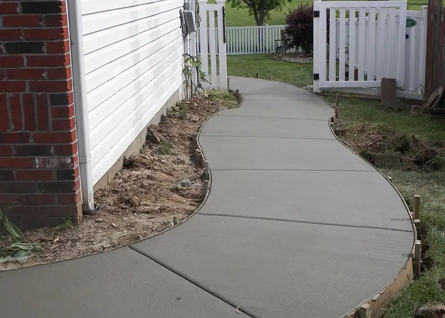 poured concrete slabs to make up sidewalk/walkway left to dry - Collinsville, IL