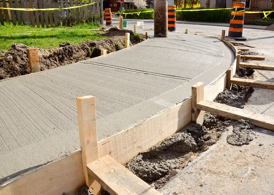 concrete sidewalk construction, installation, framed wet concrete setting - Collinsville, IL